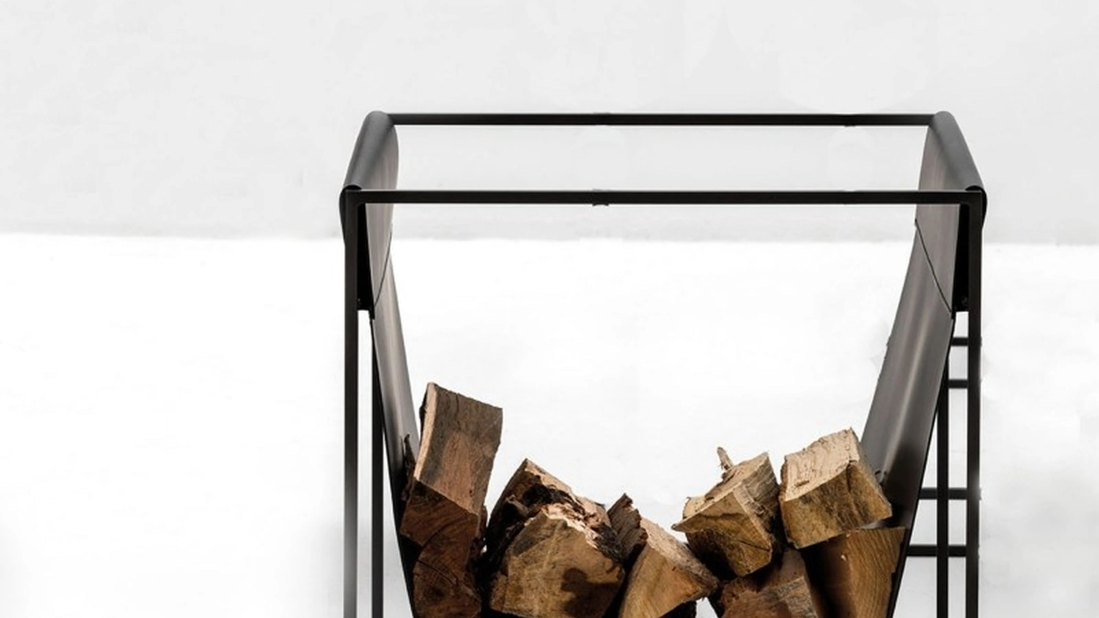 Contenitore Wave Portalegna in metallo color antracite di Adriani e Rossi