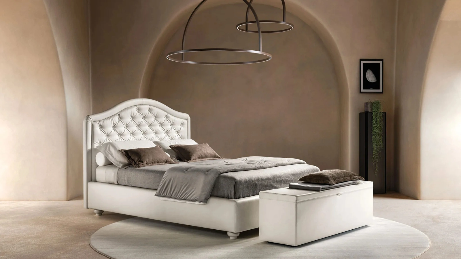 Letto in ecopelle con testiera sagomata e trapuntata Infinity di BsideLetto in ecopelle con testiera sagomata e trapuntata Infinity di Bside