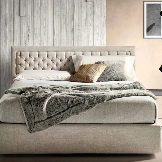 Letto in tessuto con testiera trapuntata Nest di Bside