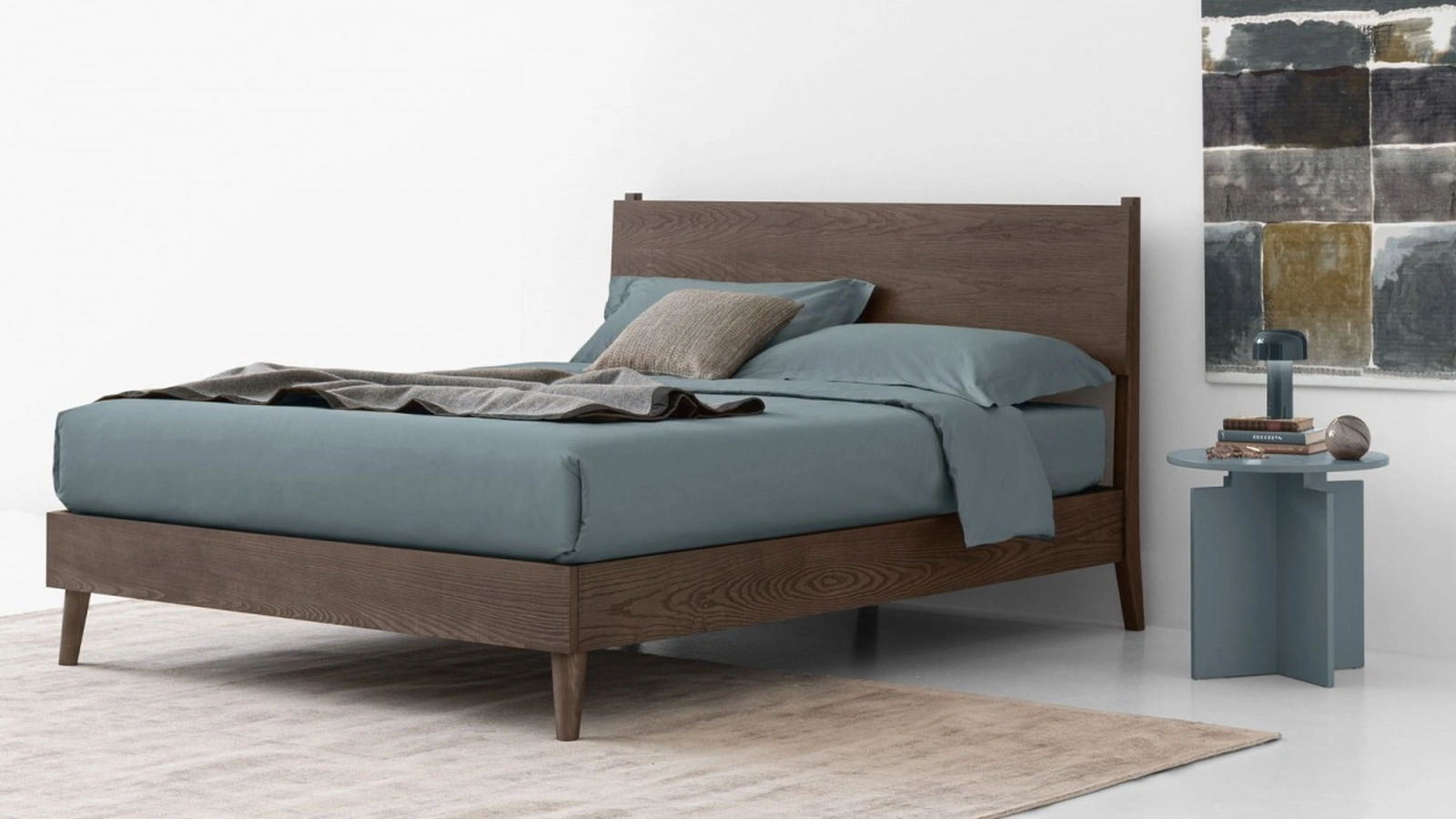 Letto in legno con testiera e contenitore Orimento di Oggioni