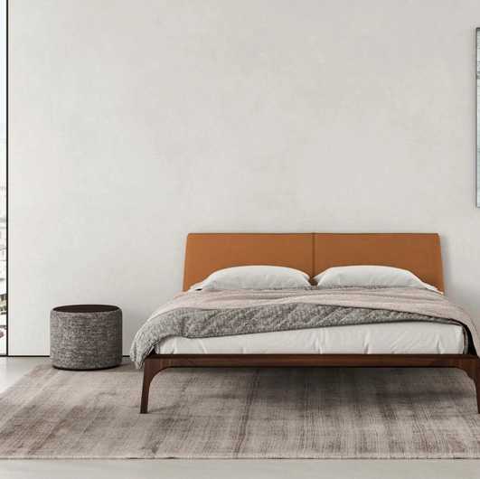 Letto Relevè Imbottito con testiera rivestita in pelle di Presotto