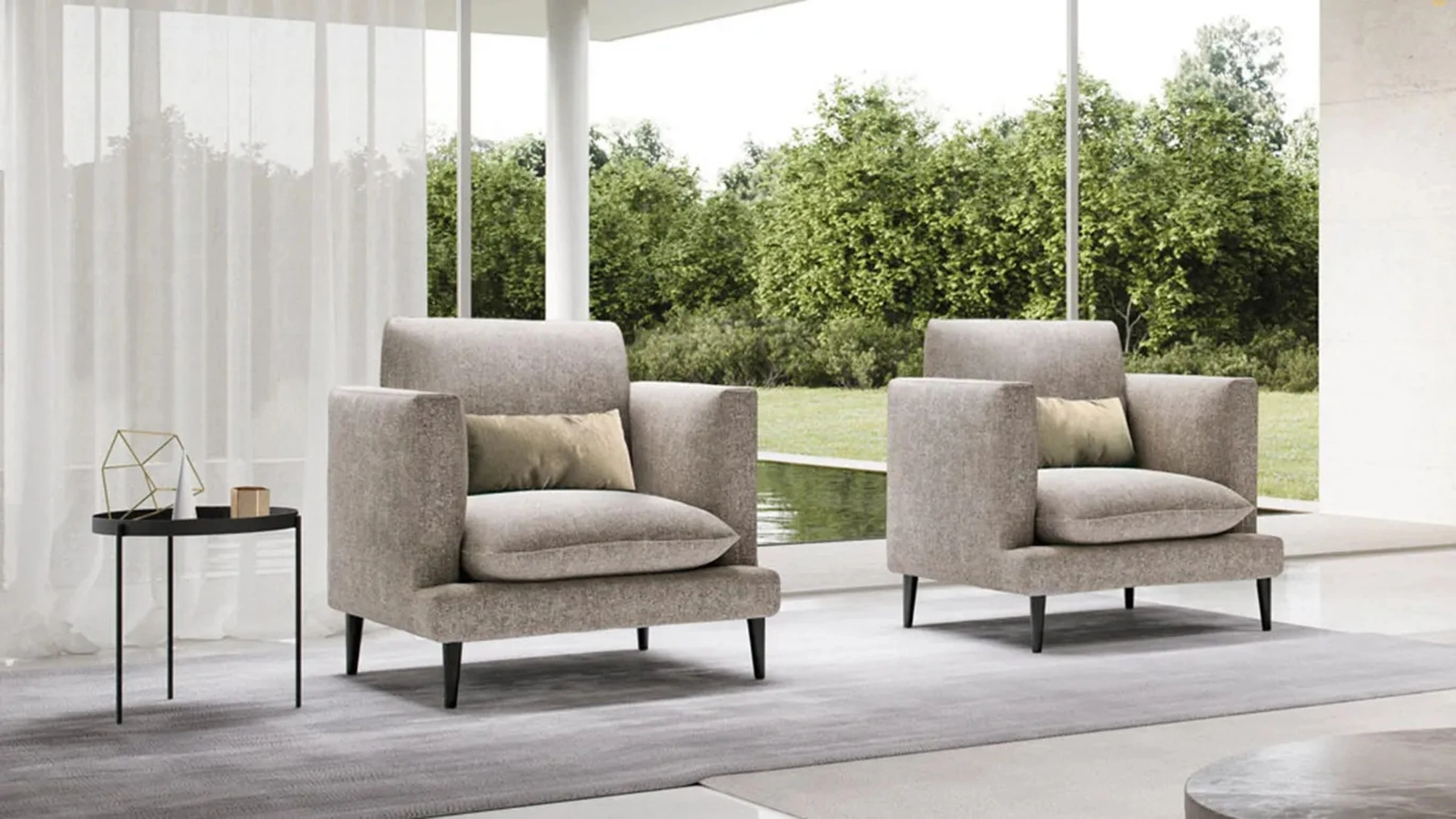 Poltrona Klint in tessuto di Doimo Salotti