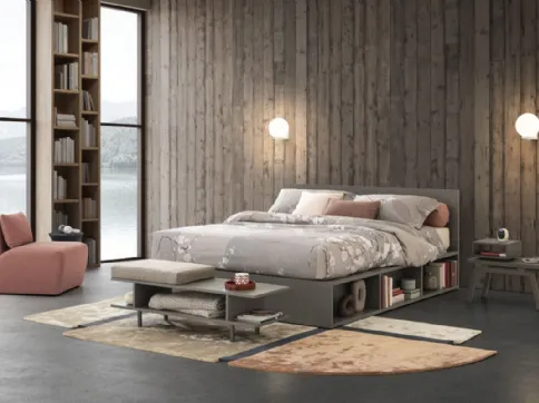 Letto in legno dalle linee essenziali Pongo con testiera e librerie laterali di Oggioni