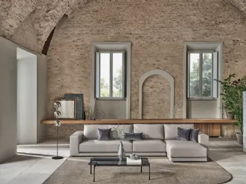 Divano in ecopelle con penisola Pitagora di Bontempi