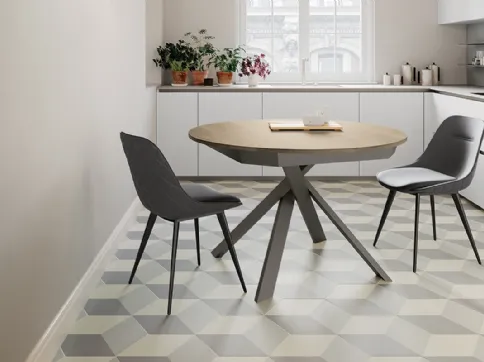 Tavolo rotondo allungabile Twist con top in laminato e gambe in metallo verniciato di Arredo3